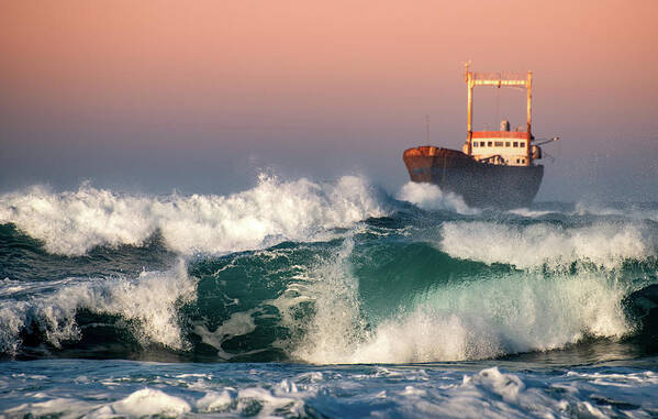 Sea Art Print featuring the photograph Abandoned Ship and the stormy waves by Michalakis Ppalis