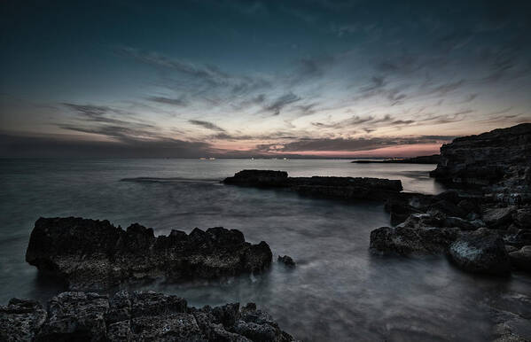 Seascape Art Print featuring the photograph Beautiful dramatic Sunset on a rocky coastline by Michalakis Ppalis