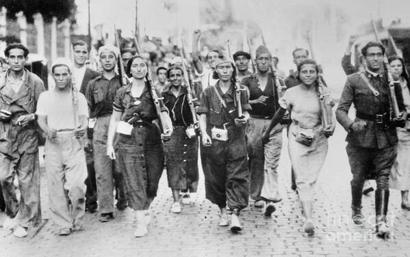 Rifle Art Print featuring the photograph Women With Rifles Marching by Bettmann