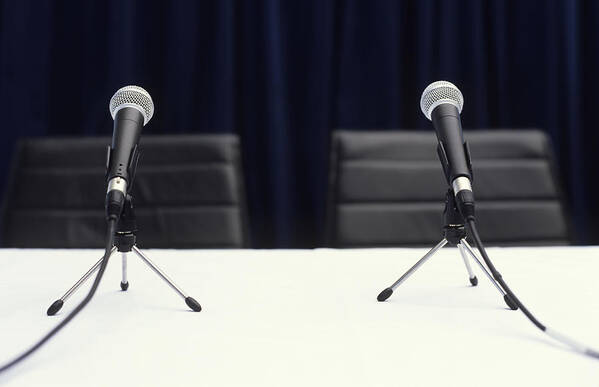 Part Of A Series Art Print featuring the photograph Two microphones on table, close up by George Doyle