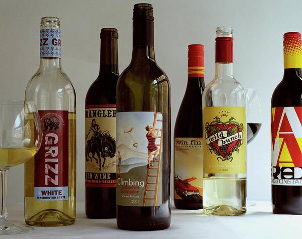 Food Art Print featuring the photograph A Collection Of Wine Bottles by Romulo Yanes