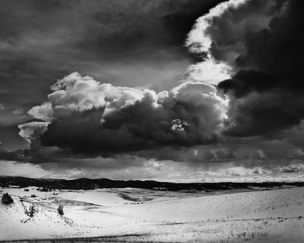 Clouds Art Print featuring the photograph Dark Clouds Over Snowy Landscape by Theresa Tahara