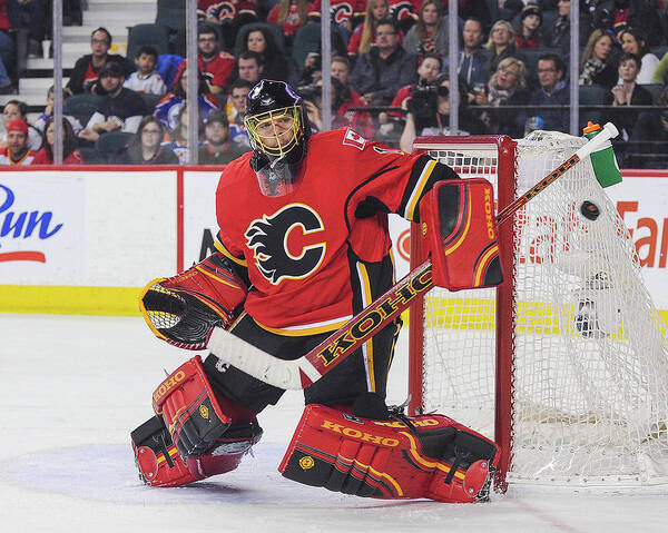 Jonas Hiller Art Print featuring the photograph Edmonton Oilers V Calgary Flames by Derek Leung