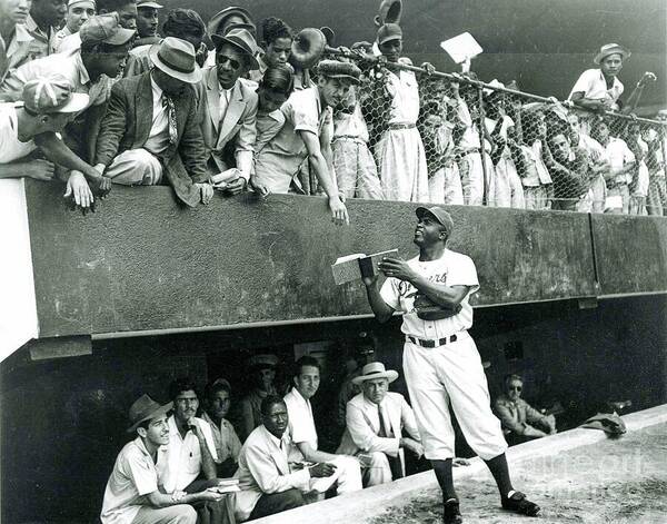Jackie Robinson Art Print featuring the photograph Jackie Robinson signs autographs vintage baseball by Vintage Collectables