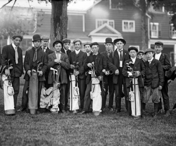 14-20 Years Art Print featuring the photograph Portrait Of Golf Caddies by Underwood Archives