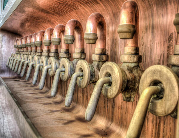 Sleeman Brewery Ltd. Art Print featuring the photograph The beer valves by Nick Mares