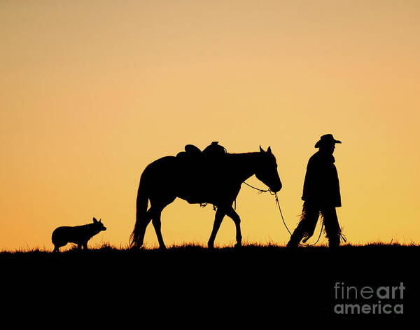 Cowboy Art Print featuring the photograph Cowboy and his horse and dog at sunrise by Carien Schippers