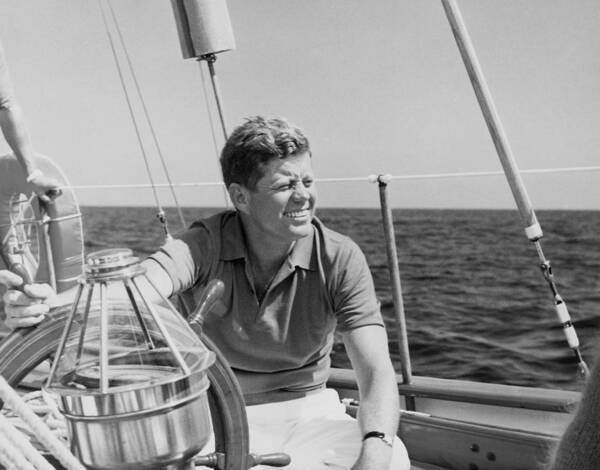 President Kennedy Art Print featuring the photograph JFK Sailing On Vacation by War Is Hell Store