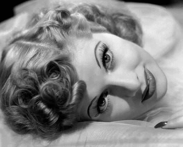 1941 Art Print featuring the photograph Lucille Ball Lying On Silk #1 by Ernest Bachrach