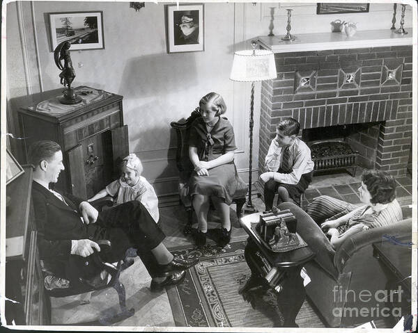Mid Adult Women Art Print featuring the photograph Family Seated In Living Room by Bettmann