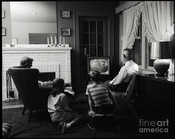 Mid Adult Women Art Print featuring the photograph Family Watching Television In Living by Bettmann
