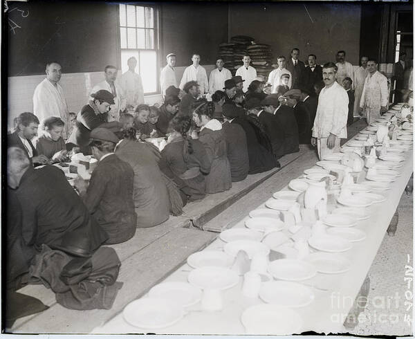Coin Art Print featuring the photograph Immigrants Being Served Dinner by Bettmann