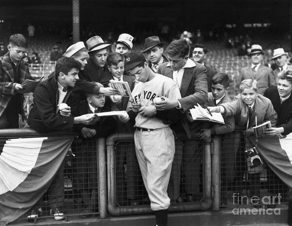 Three Quarter Length Art Print featuring the photograph Joe Dimaggio Signing Autographs For Fans by Bettmann