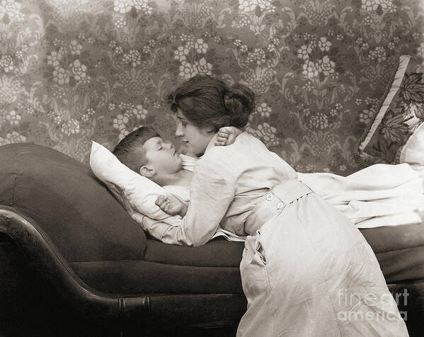 People Art Print featuring the photograph Mother Putting Her Son To Sleep by Bettmann