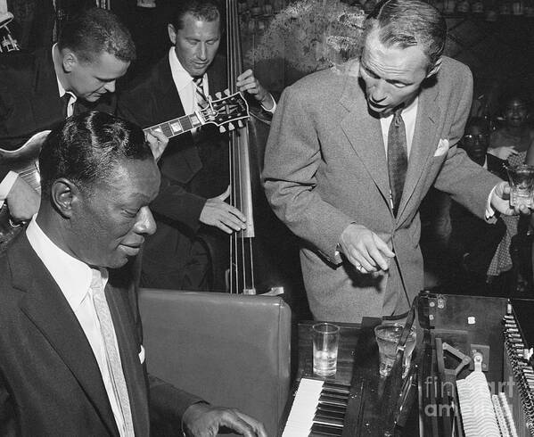 Singer Art Print featuring the photograph Nat King Cole Playing With Frank Sinatra by Bettmann