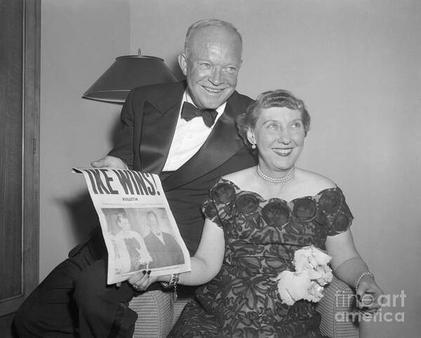 People Art Print featuring the photograph Pres.eisenhower And Wife With Paper by Bettmann