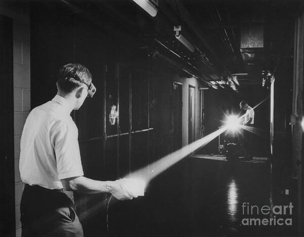 People Art Print featuring the photograph Scientists Measuring Argon Gas Laser by Bettmann