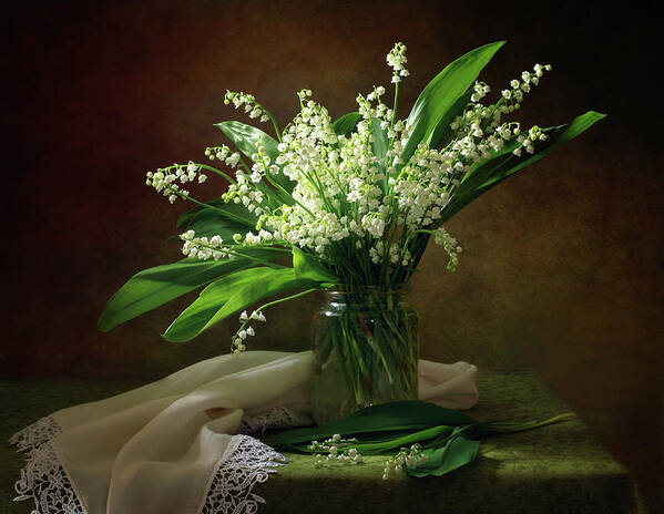Lily Of The Valley Art Print featuring the photograph With A Bouquet Of Lilies Of The Valley by Tatyana Skorokhod (???????
