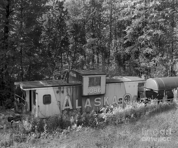 Caboose Art Print featuring the photograph An Abandoned Alaska Railroad Caboose in Black and White by L Bosco