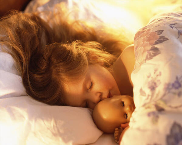 4-5 Years Art Print featuring the photograph Young girl in bed asleep with doll by Peter Cade