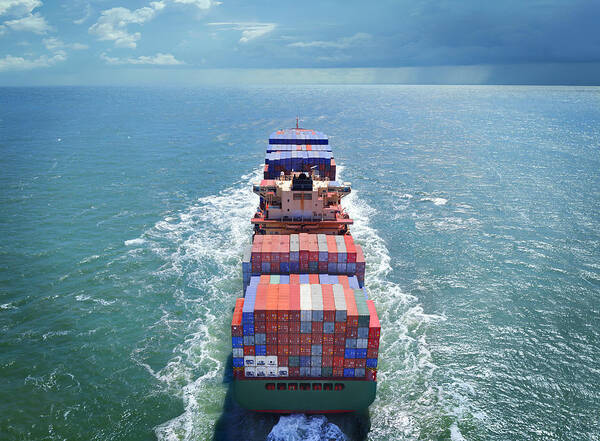 Freight Transportation Art Print featuring the photograph Aerial view of freight ship with cargo containers by Narvikk