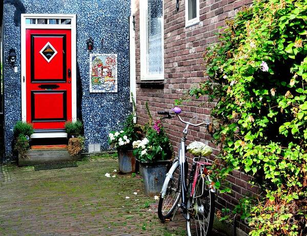 Red Art Print featuring the photograph Colorful Alleyway in Dutch Village by Joe Ng
