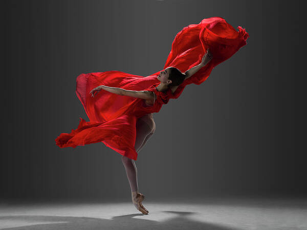Correct tandarts Onnodig Ballerina Performing On Pointe In Red Art Print by Nisian Hughes -  Photos.com