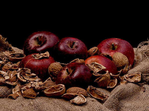 Apples Art Print featuring the photograph Apples and nutshells by Mike Santis