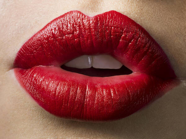 People Art Print featuring the photograph Female lips with red lipstick on, close up by Jonathan Knowles