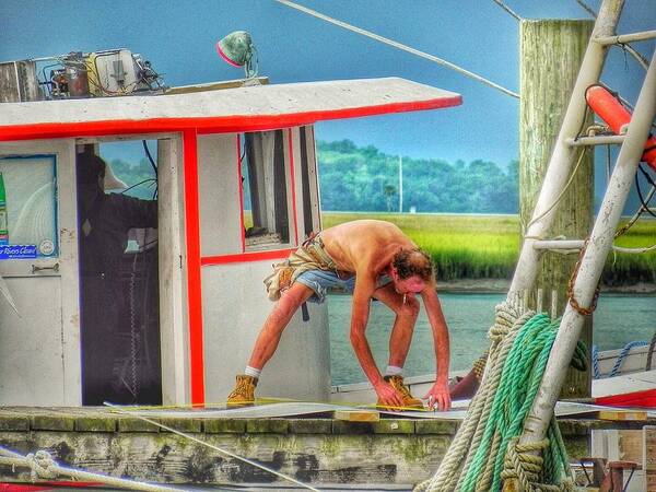 Fisherman Commercial Fishing Art Print featuring the photograph Fisherman Working on His Boat by Patricia Greer