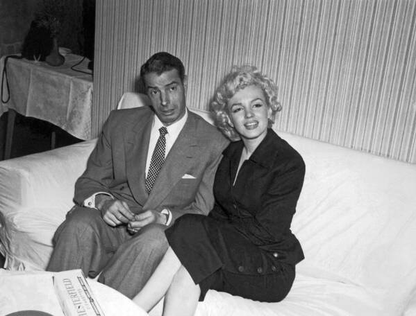 1954 Art Print featuring the photograph Marilyn Monroe And Joe DiMaggio by Underwood Archives