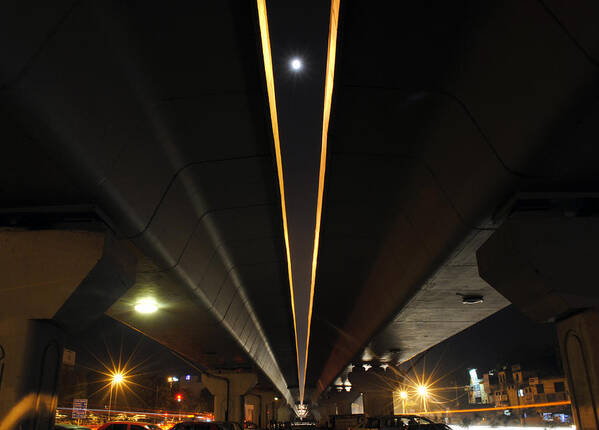 Cars Art Print featuring the photograph Moon visible between the flyover gap by Sumit Mehndiratta
