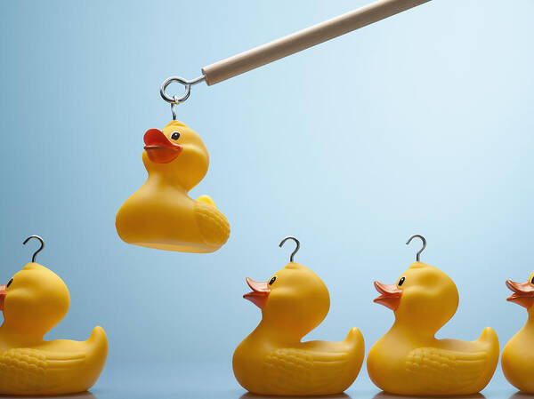 Five Objects Art Print featuring the photograph Pole lifting rubber duck with hook in its head by Andy Roberts