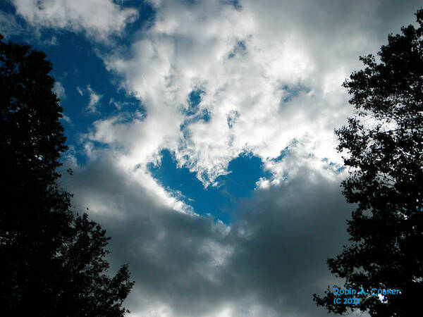 A Heart Etched In The Naturally Art Print featuring the photograph A Heart in the sky by Robin Coaker