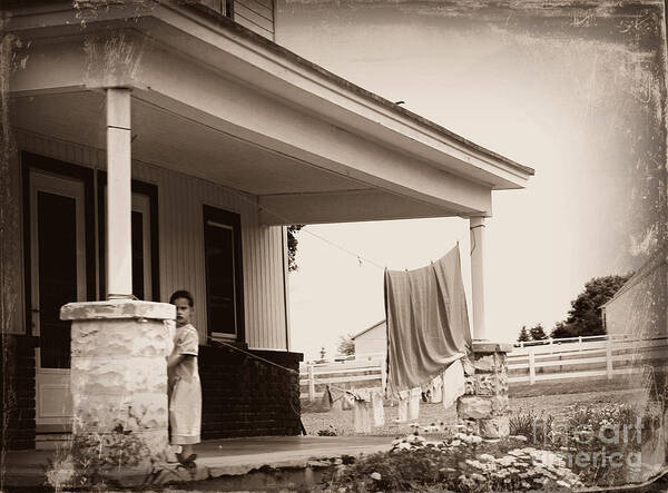 Laundry Art Print featuring the photograph Mennonite Girl Hanging Laundry by Beth Ferris Sale