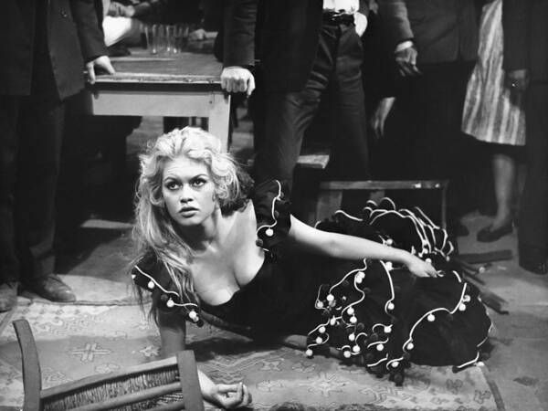 Brigitte Bardot Art Print featuring the photograph Brigitte Bardot: Sultry Expression Lying On Floor by Globe Photos