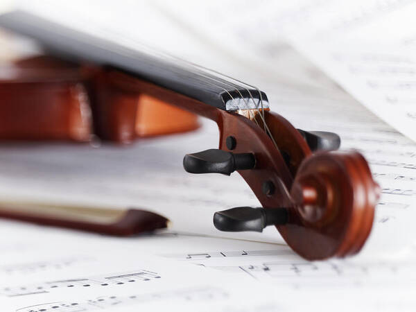 Sheet Music Art Print featuring the photograph Close Up Of Violin, Bow And Sheet Music by Adam Gault