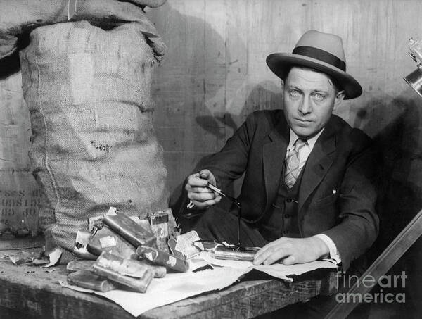 People Art Print featuring the photograph Customs Officer Examining Confiscated by Bettmann