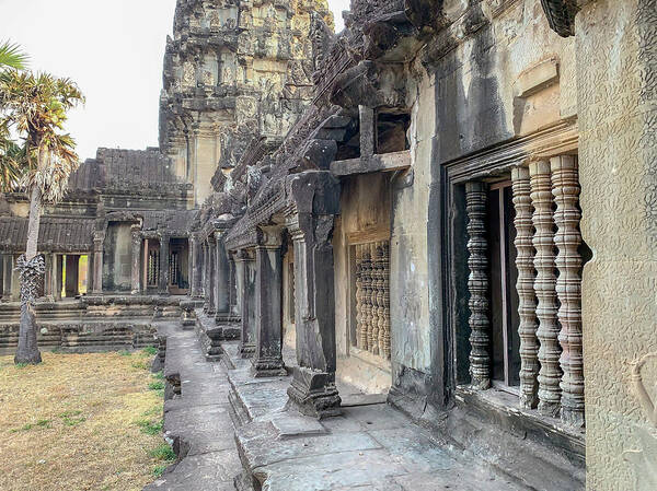 Ancient Art Print featuring the photograph Entrance wall around Angkor Wat temple in Cambodia by Karen Foley