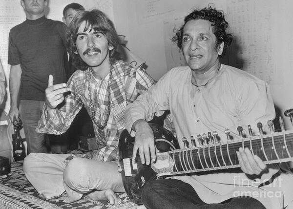 People Art Print featuring the photograph George Harrison With Indian Musician by Bettmann