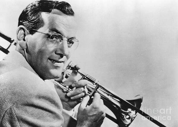 Musical Conductor Art Print featuring the photograph Glenn Miller Holding Trombone by Bettmann