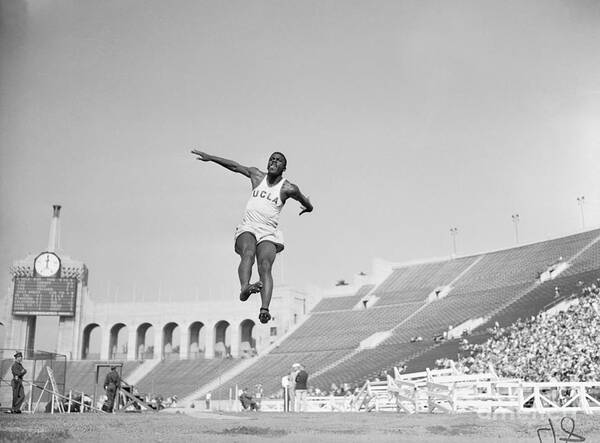 Wind Art Print featuring the photograph Jackie Robinson At A Track Meet by Bettmann