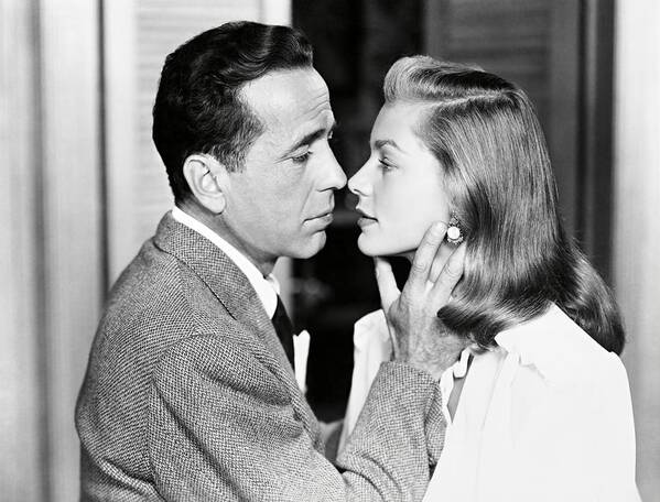 Humphrey Bogart Art Print featuring the photograph LAUREN BACALL and HUMPHREY BOGART in DARK PASSAGE -1947-. by Album