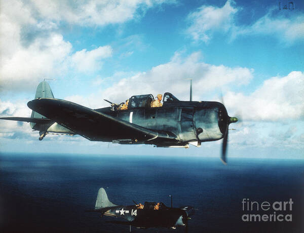 Releasing Art Print featuring the photograph Navy Dive Bombers In Flight by Bettmann