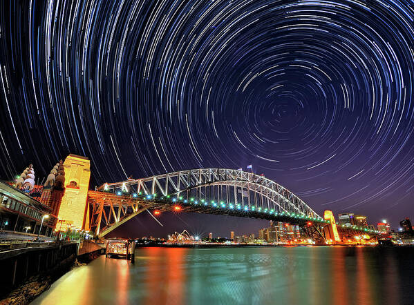Sydney Harbor Bridge Art Print featuring the photograph Star-trail Over Sydney by Atomiczen