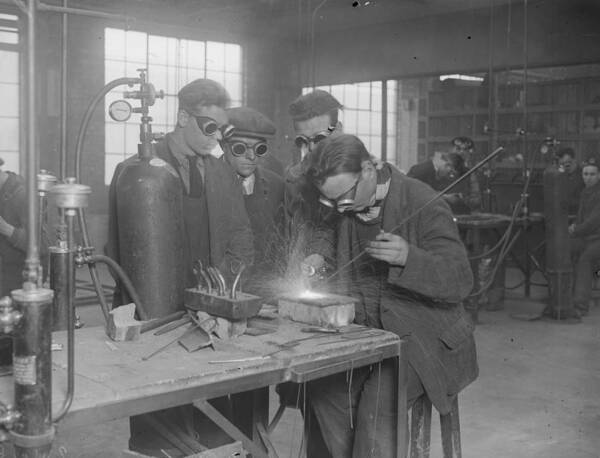 1930-1939 Art Print featuring the photograph Welding Class by Fox Photos