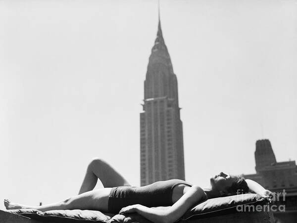 People Art Print featuring the photograph Woman Sun Bathing In Manhattan by Bettmann