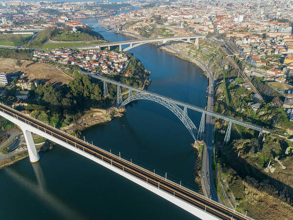 Portugal Art Print featuring the photograph Aerial of bridges and Douro river in Porto #1 by Mikhail Kokhanchikov