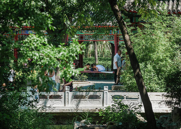 2013 Art Print featuring the photograph Children playing in a park of Tianjin City by Benoit Bruchez