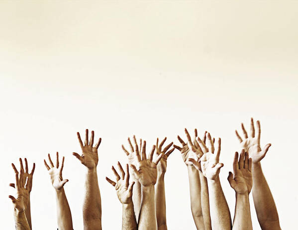 Hand Raised Art Print featuring the photograph Hands in the air by David Trood